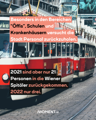 Eine rot-weiße Straßenbahn.