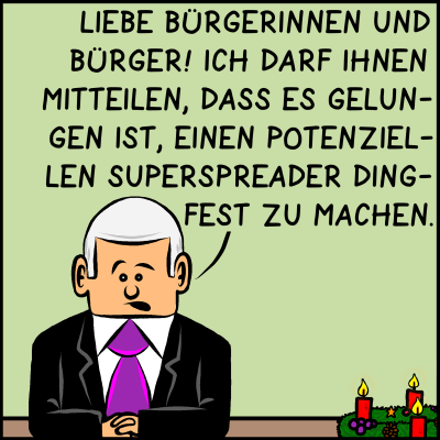 Hebel der Macht: Weihnachtliche Frohbotschaft. Man sieht den Premierminister mit ernstem Blick und einem Adventkranz.