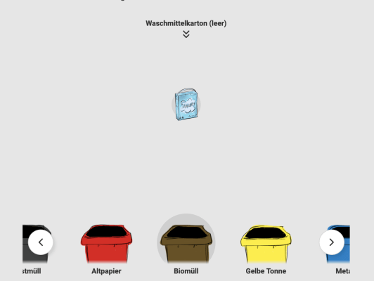 Screenshot aus einem Mülltrenn-Spiel, zu sehen sind ein Waschmittelkarton, der in die richtige der fünf abgebildeten Tonnen geworfen werden muss.
