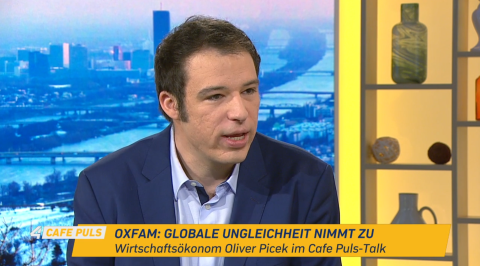 Screenshot von Oliver Picek, Chefökonom des Momentum Instituts, der im Café Puls Talk über die Oxfam Studie zu globaler Ungleichheit spricht.